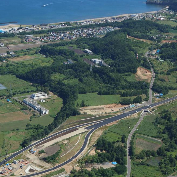 後志自動車道の余市IC付近の様子。写真は余市IC～小樽JCT開通時に撮影されたもの。 画像：NEXCO東日本