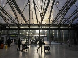 Passengers at Heathrow Airport in London. Photographer: Jason Alden/Bloomberg