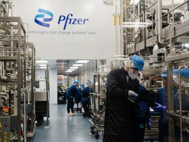 Workers at the Pfizer research and manufacturing site in Andover, Massachusetts. Photographer: Sophie Park/Bloomberg