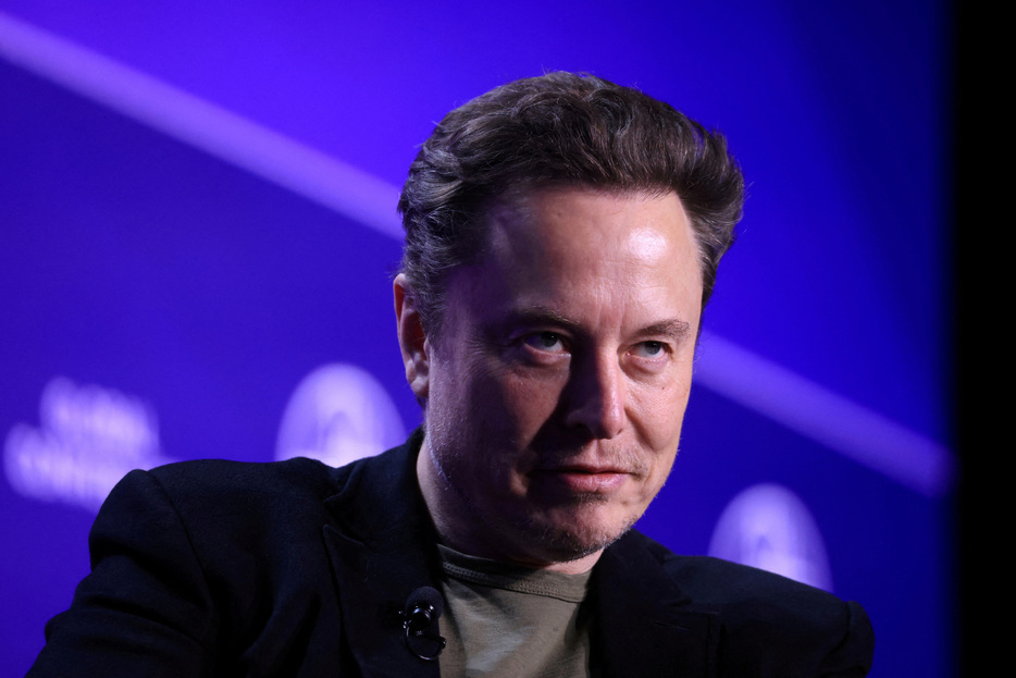 FILE PHOTO: Elon Musk, Chief Executive Officer of SpaceX and Tesla and owner of X looks on during the Milken Conference 2024 Global Conference Sessions at The Beverly Hilton in Beverly Hills, California, U.S., May 6, 2024. REUTERS/David Swanson/File Photo