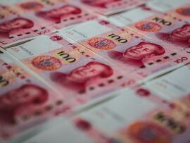 The yuan has weakened 1.8% this month versus the dollar in offshore trading. Photographer: Lam Yik/Bloomberg