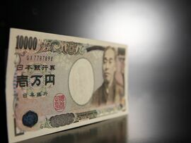 A Japanese 10000-yen note is arranged for a photograph in Tokyo, May 26, 2009.