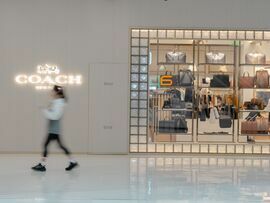 <p>A Coach store in the Wangfujing shopping area in Beijing, China, on Friday, Sept. 13, 2024. </p>