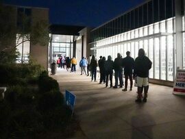 Voters wait in line to cast their ballots in Atlanta. Photographer: , Megan Varner/Getty Images