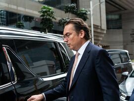 Segantii Capital Management founder Simon Sadler leaves the District Court in Hong Kong in July. Bloomberg Bloomberg