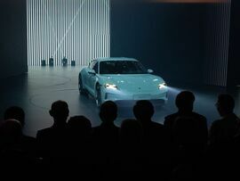 A Porsche Taycan at a launch event in Beijing. Source:  /Bloomberg