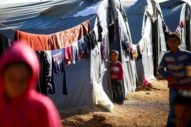 クルド人難民のキャンプ＝2014年10月18日（ロイター/アフロ）