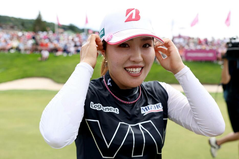 エビアン選手権で初優勝し、笑顔の古江彩佳＝14日、エビアン・リゾート（ゲッティ＝共同）