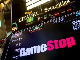 <p>GameStop Corp. signage on the floor of the New York Stock Exchange (NYSE) in New York, US. </p>