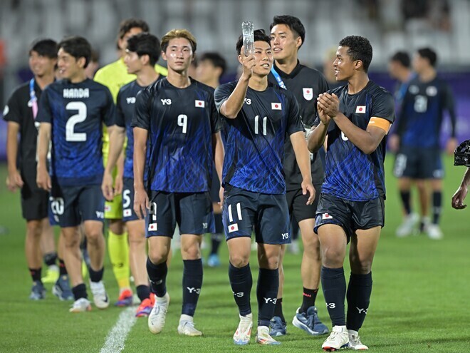 ２大会連続の決勝トーナメント進出を決めた日本。写真：金子拓弥 (サッカーダイジェスト写真部／JMPA代表撮影)