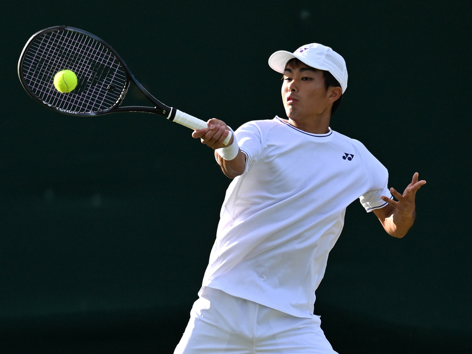 写真はジュニア男子シングルス1回戦での本田尚也（文星芸術大学附属高等学校）（Getty Images）