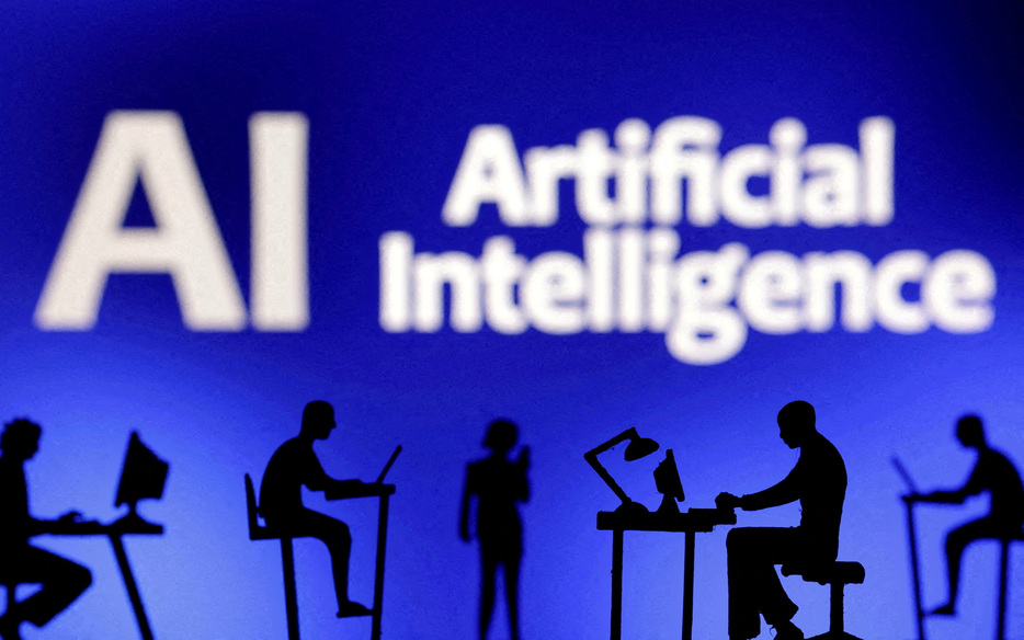 FILE PHOTO: Figurines with computers and smartphones are seen in front of the words ""Artificial Intelligence AI"" in this illustration taken, February 19, 2024. REUTERS/Dado Ruvic/Illustration/File Photo