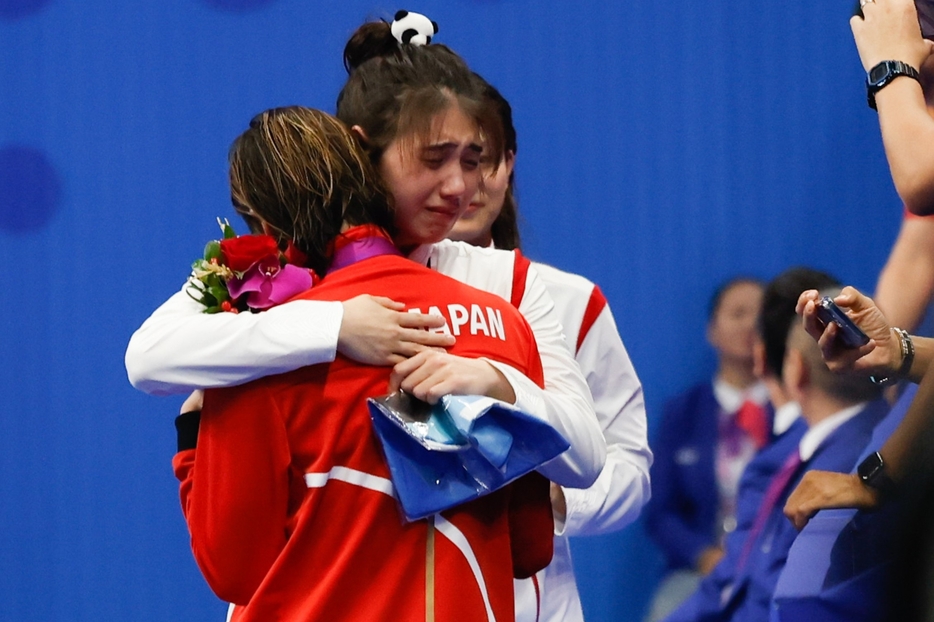 アジア大会でも友情シーンが話題となった池江と張。(C)Getty Images