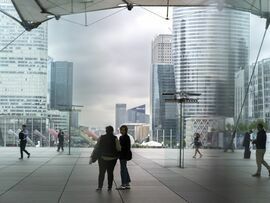 City workers in the La Defense business district of Paris. Photographer: Nathan Laine/Bloomberg