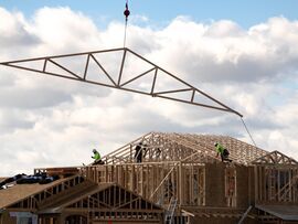 Workers at a home under construction in Tucson, Arizona. Photographer: Rebecca Noble/Bloomberg