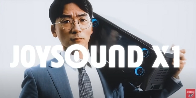 JOYSOUNDのWEB CMでデス声で熱唱するサラリーマンは？