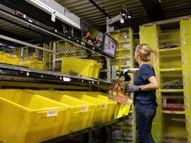 An employee scans an item at a fulfillment center in Robbinsville, New Jersey.