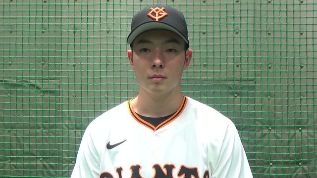 インタビューに応えた石田充冴投手