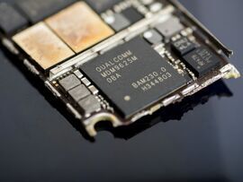 Apple has spent years trying to replace the Qualcomm modem chip in its iPhones. Photographer: Brent Lewin/Bloomberg