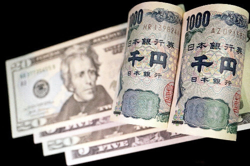 円とドルの紙幣＝ロイター