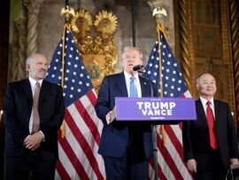 <p>Donald Trump delivers remarks alongside Howard Lutnick, left, and Masayoshi Son at the Mar-a-Lago, Florida, on Dec. 16.</p>